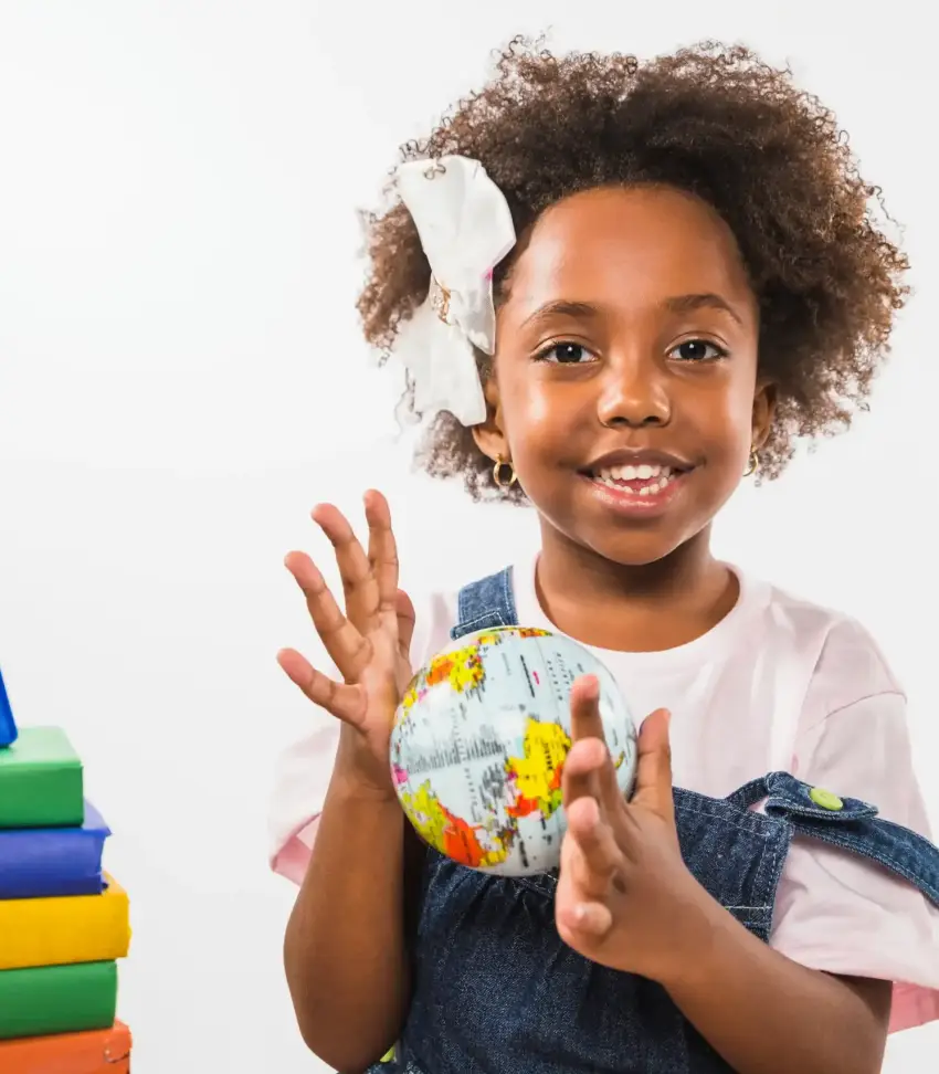 child-playing-with-globe-studio