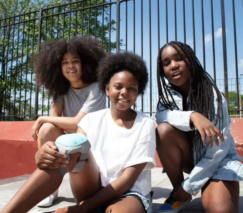 group-black-girls-spending-time-together-outdoors